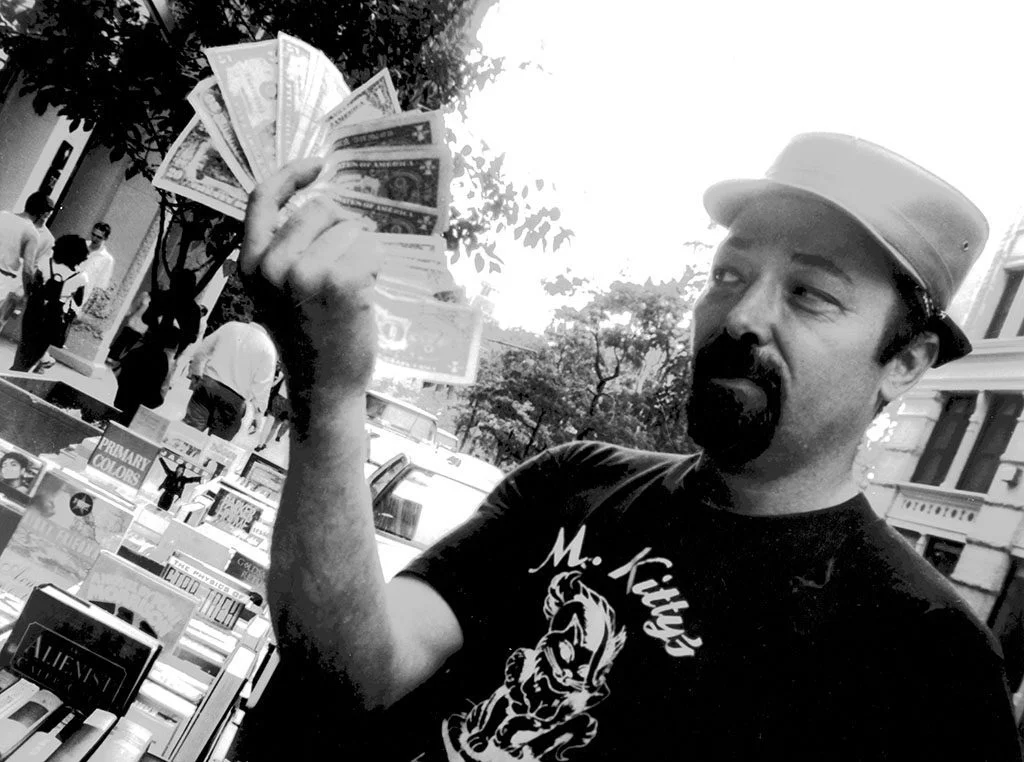 Street bookseller Pete shows off his cash in the New York bookseller documentary, 'BookWars'